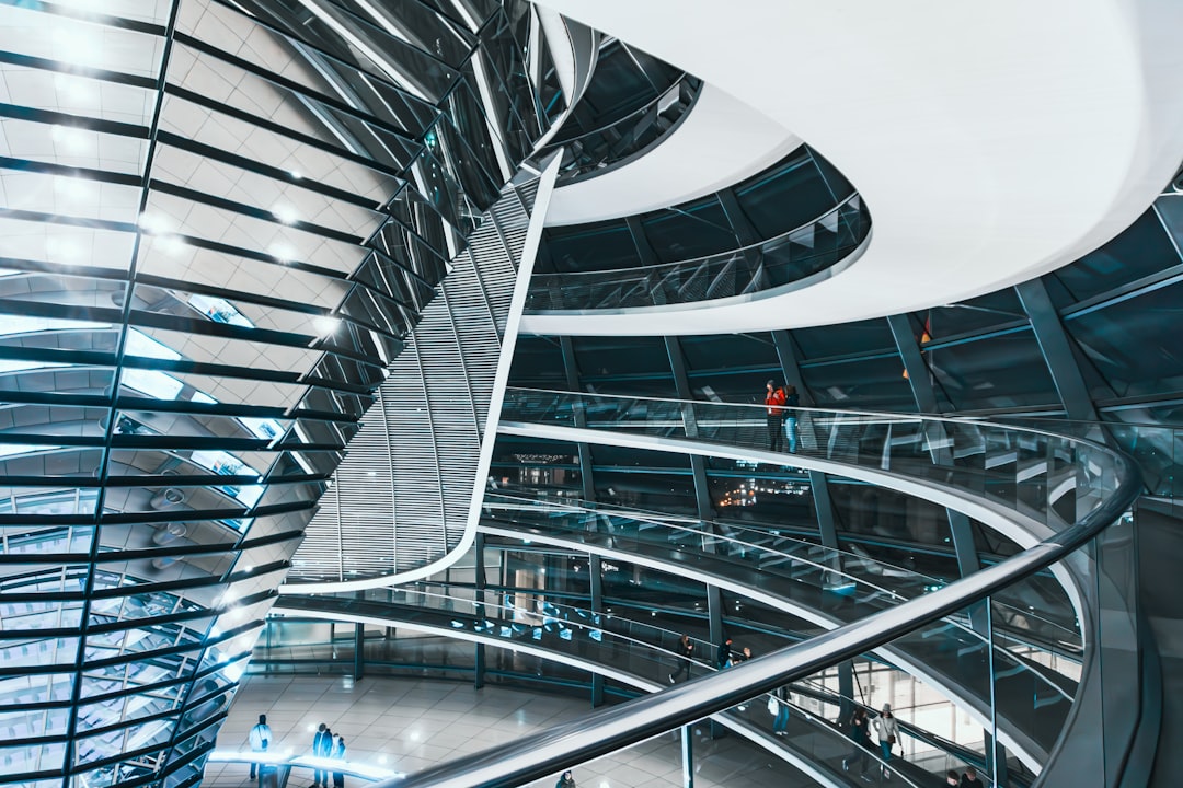 ours-journey modern-spiral-staircase-inside-a-glass-building-evmx6pasqq0